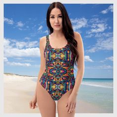 This Women's Cheeky One-Piece Swimsuit/Bathing Suit for all figures will bring out your best features. Enjoy the smooth fabric and the Unique & Colorful Abstract Tribal Design, and show it off by the beach or pool! Sizes XS-Plus Size available. * 82% Polyester, 18% Spandex * Fabric weight: 6.78 oz/yd² (230 g/m weight may vary by 5% * Chlorine-resistant fabric * Cheeky fit with a scoop neckline and a low scoop back * Zig-zag stitching * Double-layer front  * Four-way stretch material stretches an Multicolor Stretch Swimwear For Vacation, Stretch Multicolor Swimwear For Beach, Fitted Multicolor One-piece For Sunbathing, Stretch Multicolor Beachwear Swimwear, Vibrant Stretch Swimwear For Beach Season, Vibrant Stretch Swimwear For Sunbathing, Printed Swimwear For Beach Season Festivals, Printed One Piece Swimsuit For Beach Season, Printed Swimwear For Festival During Beach Season