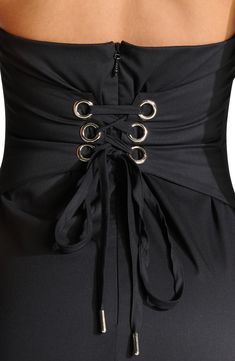 A corset-inspired waist with a lace-up back adds shapely structure to this chic maxi framed by halter and cut to a leggy length. 58" length (size Small) Back zip closure; lace-up closure; ties at neck Halter neck Sleeveless, with cutaway shoulders Side slit 77% polyester, 20% modal, 3% spandex Hand wash, line dry Imported Corset Tie Back Dress, Corset With Zip At The Back, Halter Corset, Dress Trims, Naked Wardrobe, Rollerball Perfume, Black Fits, Nordstrom Dresses, Dress Backs