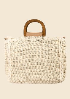 This is a stunning must have tote bag features a gorgeous braided square tote bag design. An excellent choice for Summer or Beach vibes! Fully lined with interior pockets and crossbody option This tote bag approximately measures: Length: 15 Inches Width: 3 Inches Height: 14 Inches Square Beige Shoulder Bag For Vacation, Beige Square Shoulder Bag For Vacation, Chic Straw Tote Bag With Adjustable Strap, Summer Travel Top Handle Box Bag, Chic Natural Box Bag For Summer, White Top Handle Satchel For Beach, Square Beige Satchel For Vacation, Vacation Woven Satchel Bag, Summer White Top Handle Shoulder Bag