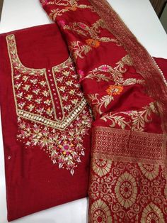 Item Overview ATHARVA Hand Embroidered Salwar Kameez in Red w/Beautiful Embroidered Neck/Beautiful Banarsi Minakari Silk Maroon Dupatta/Customized Stitching/ Wedding/Bridal Trousseau Dno. CH1674 Fabric: * Shirt: Chanderi - Reds- 2.5 Mts, with Beautiful Embroidery Neck * Dupatta: Minakari Banarsi Silk Dupatta (Motifs may wary) * Salwar: Santoon Silk 2.5 Mts. Excusive Hand Embroidered Party Wear Punjabi Suit. Customization: * Fabrics Customization: Designs Can be made in different Fabrics. *Color Traditional Designer Anarkali Set With Dupatta, Traditional Anarkali Set With Dupatta For Designer Wear, Designer Anarkali Traditional Wear In Dola Silk, Red Kundan Kurta For Festivals, Churidar With Zari Work For Navratri, Anarkali Traditional Wear In Dola Silk For Transitional Season, Dola Silk Anarkali For Transitional Season, Transitional Anarkali Traditional Wear In Dola Silk, Chandbali Anarkali Set In Jamawar For Navratri