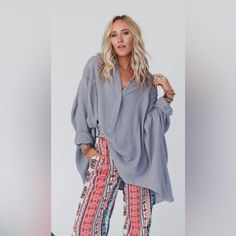 Three Bird Nest - Top Notch Oversized Top - Gray - M Top Notch Oversized Top Is The Perfect Boho Twist To A Classic Button-Up! You're Going To Love Wearing It Because It Features: Oversized, Flowy Silhouette Comfortable, Textured, Non-Stretch, Woven Fabric Exaggerated Henley Neckline Front Closure Mandarin Collar Neckline Cute Pleated Details Along The Shoulders Exposed Seams For Added Style High-Low Bottom Hem Long Balloon Sleeves Yoke Back Detail Go-To Boho Outfit Pair With: Seamless V Neck Br Relaxed Fit Gray Top For Beach, Oversized Chic Blouse For Brunch, Oversized Long Sleeve Blouse For Brunch, Oversized Cotton Top For Brunch, Oversized Gray Casual Blouse, Casual Oversized Gray Blouse, Billowy Long Sleeve Beach Top, Oversized Fall Top For Brunch, Oversized Tops For Fall Brunch