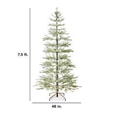 a tall white christmas tree is shown with measurements