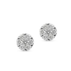 Classic and elegant, these diamond stud earrings are a must-have look any woman will adore. Created in 18K white gold, each earring features a glistening flower-shaped composite of shimmering brilliant cut round diamonds that catches the eye. A traditional look that complements any attire, the earrings captivate with 0.52 carats of diamonds and a polished shine. The post earrings secure comfortable with friction backs.
0.52 carat diamonds studs
18K white gold
The earring design can be custo Flower Diamond Earrings, Studs Diamond, Emerald Earrings Drop, Jewelry Staples, Fancy Jewellery, Buying Diamonds, Diamond Stud Earrings, Diamond Flower, Tennis Bracelet Diamond