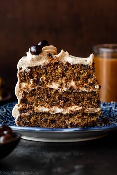 a slice of carrot cake on a blue plate