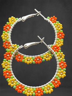 Hoop earrings Nickel Free Small Hoop Beaded Earrings For Festivals, Multicolor Nickel-free Hoop Earrings For Festivals, Handmade Multicolor Metal Hoop Earrings, Bohemian Small Hoop Orange Jewelry, Bohemian Metal Hoop Earrings With Colorful Beads, Bohemian Silver Hoop Earrings With Colorful Beads, Small Hoop Beaded Earrings For Festival, Festival Small Hoop Beaded Earrings, Trendy Handmade Festival Hoop Earrings