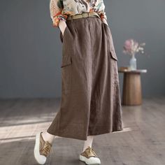 Details: Gender: Women Item Type: Skirts Material: Linen Season: Summer Pattern: Solid Style: Casual, Loose, Retro Waist Type: Elastic Waist Size: One Size Waist: 70.00 - 102.00 cm/ 27.56 - 40.16 " Length: 82.00 cm/ 32.28 " Hip: 108.00 cm/ 42.52 " Casual Non-stretch Skirt With Pockets, Full Length Skirt With Side Pockets, Solid Color Midi Skirt With Pockets, Brown Cargo Skirt With Pockets For Spring, Brown Full-length Skirt For Spring, Spring Full Length Brown Skirt, Brown Full Length Skirt For Spring, Casual Long Skirt With Side Pockets, Spring Full Length Solid Color Skirt