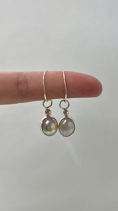 Handmade Freshwater Keshi Pearl Earrings, each earring contains real and natural Keshi pearls. The pearls are around 8~10x7.5x7.5mm, making them perfect for everyday wear. All earrings are handmade, from sawing, soldering, assembling, polishing and packaging! make them one of the kind! The Pearl earrings are all made from 100% recycled sterling silver. All earrings come with a cushion-lined kraft gift box, making it perfect for gifting!🤍 Aftercare: The Pearl earrings are made from sterling silver so they won't irritate the skin or change colour. But I do recommend taking off your earrings in the shower and avoiding spraying perfume on/near the earrings. Follow the simple rules to keep your earrings bright and shiny! ✨ Etsy Silver Earrings, Rock Earrings, Spraying Perfume, Keshi Pearl Earrings, Pearl Earrings Handmade, Bubble Earrings, Handmade Dangle Earrings, Blue Opal Ring, Bubble Necklaces