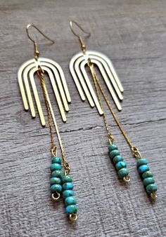 Super cute and lightweight earrings.  Get your style on today with one of these unique yet modern pairs! Brass geometric shape design with elegant gold tassel. Turquoise seed beads (8/0) that sway. Turquoise Earrings With Gold Beads, Turquoise Tassel Earrings With Dangling Beads, Turquoise Metal Dangle Beaded Earrings, Turquoise Metal Beaded Dangle Earrings, Turquoise Beaded Dangle Earrings, Geometric Shapes Design, Beach Jewelry Boho, Glam Earrings, Beach Boho