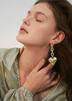 Take a leap of faith with our Love Heart Chain Link Drop Earrings! These chic earrings add a touch of daring to any outfit. Elevate your style game with these bold women's fashion accessories. 3 1/4" (8.5cm) drop 1 1/4" (3cm) width Post back Alloy 24k-gold plate Women's drop earrings Item #452905 Trendy Drop Earrings For Valentine's Day, Trendy Valentine's Day Drop Earrings, Trendy Valentine's Day Jewelry, Chic Heart Earrings For Parties, Trendy Metal Heart Earrings For Party, Trendy Pierced Heart Earrings, Trendy Heart Earrings For Party, Trendy Party Heart Earrings, Valentine's Day Heart Drop Earrings