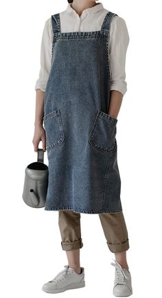 PRICES MAY VARY. MATERIAL---100% cotton denim. The 100% cotton denim apron adopts the special process of washing and nostalgic, which makes the apron extraordinary in texture. SIZE---41.3in/105cm wide, 33.4in/85cm long; Shoulder strap length 23.6in/60cm. EASY to CLEAN---Machine wash or hand wash warm with like colors,please note that do not bleach, tumble dry low and warm iron if needed. CROSS-BACK DESIGN---Cross-back design makes this apron convenient to wear and no longer slip from the shoulde Cross Back Aprons, Primitive Clothing, Branded Aprons, Cross Back Apron, Denim Apron, Apron With Pockets, Shop Kitchen, Head Set, Gardening Apron