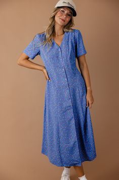 This blue beauty features functional buttons, a v-neckline, and a sewn-in tie. Pair the Head First Button Down Dress with your favorite pair of sneakers and a trucker hat for a trendy and cute look. nursing friendly Dress And Sneakers, Dress And Sneakers Outfit, Pictures Outfits, Beauty Features, Blue Beauty, Family Picture Outfits, Nursing Friendly, Picture Outfits, Button Down Dress