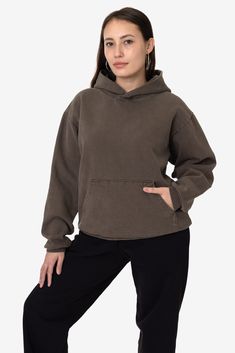 Made from a luxurious 14oz fleece, this hoodie is incredibly soft and warm, yet still breathable and moisture-wicking. The loose fit allows for a full range of motion, making it perfect for everything from running errands to lounging around the house. The kangaroo pocket provides ample storage for your essentials, while the ribbed cuffs and hem keep the cold out. This hoodie is Garment Dyed. Our garment-dyed hoodies are dyed after they're sewn, which gives them a more durable and even color, inc Hoodie Styling, Lace Knitwear, Essential Hoodie, Stocking Stuffers For Women, Outfit Hoodie, Kids Garments, Denim Sweater, Stay True, Sleeveless Vest