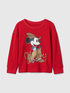 Soft cotton graphic T-shirt.  Crewneck.  Long sleeves.  Mickey Mouse and friends graphics at front and sleeves.  Straight, easy fit.  Hits at the hip.  Sizes range from baby to toddler. Red Crew Neck Top With Minnie Mouse Detail, Mickey Mouse Long Sleeve Shirt, Affordable Red Minnie Mouse T-shirt, Red Mickey Mouse Cotton T-shirt, Mickey Mouse Long Sleeve T-shirt For Streetwear, Mickey Mouse And Minnie Mouse, Baby Mickey Mouse, Baby Mickey, American Brand