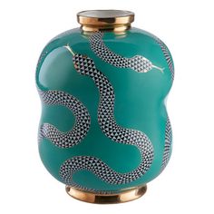 a green vase with a snake painted on it