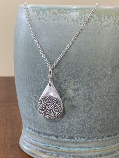 "Mandala Pendant, Sterling Silver Mandala Necklace, Inspirational Jewelry, Boho Jewelry, Teardrop Mandala, Spiritual Necklace, Mindfulness This sterling silver teardrop mandala pendant is beautiful and light weight. It has a bohemian and vintage feel to it. Mandalas symbolize that life is never ending....they also represent unity and harmony. We use only fine and sterling silver for all of our jewelry and findings, including our handmade ear wires. Our unique metalwork is shaped and hammered for Clay Mandala, Mandala Pendant, Spiritual Necklace, Mandala Necklace, Inspirational Jewelry, Vintage Lockets, Jewelry Boho, Ear Wires, Boho Jewelry