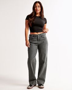 Our Curve Love low rise baggy jeans in a whitefill black wash with a clean hem. This fit features a 8.5” low rise, is slightly relaxed at waist and hips, and eases at the thigh into a baggy, full-length leg shape. We recommend buying your true size for a baggier fit. Size down for a closer fit. The viral fit that eliminates waist gap: Curve Love features additional room through the hip and thigh for curve-hugging comfort. This jean is made from our vintage stretch fabric which features both an authentic vintage look and contains slight built-in stretch for additional comfort. Low Baggy Jeans, Low Rise Baggy Jeans, Baggy Jean, Abercrombie Jeans, Women's Bottoms, Dark Denim Jeans, Low Rise Jeans, Baggy Jeans, Baggy Fits