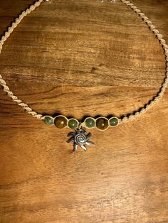 Elevate your style with the handmade hemp macrame spiral sun choker necklace! 🌿 This stunning piece is intricately crafted with love and positive energy, making it a unique accessory that will add a touch of bohemian charm to any outfit. 💫 Perfect for those who appreciate the art of handcrafting and sustainable fashion. ♻️ So go ahead, embrace your inner goddess and shine bright like the sun with our one-of-a-kind choker. Granola Jewelry, Hippie Jewelry Aesthetic, Necklaces Hippie, Sun Choker, Spiral Knot, Hemp Choker, Spiral Sun, Hippie Sun, Hemp Macrame