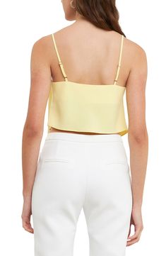 This buttery soft tank is crafted in a cropped silhouette with slinky adjustable straps and a drapey neckline. Cowl neck Adjustable straps 100% polyester Hand wash, dry flat Imported Chic Crop Top Camisole With Built-in Bra, Chic Tank Top With Built-in Bra, Chic Sleeveless Crop Top, Chic Tops With Built-in Bra And Tank Straps, Elegant Spring Tank Crop Top, Elegant Tank Crop Top For Spring, Elegant Cropped Tank Top For Spring, Elegant Spring Halter Top With Straps, Spring Crop Top With Built-in Bra For Night Out