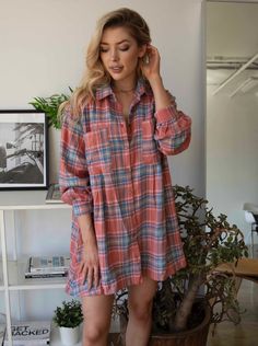 -Oversized pleated long sleeve flannel dress with button front -2 oversized pockets on chest and 2 small pockets on the bottom -Flare at the bottom -Can be worn with a belt for a more shaped look. -Color: Coral -32 inches long from shoulder to bottom -80% Cotton 20% Polyester -Size Chart Flannel Over Dress Maternity, Plaid Long Sleeve Dress With Pockets, Plaid Long-sleeve Dresses With Pockets, Long Sleeve Plaid Dress With Pockets, Casual Plaid Dress For Fall Day Out, Plaid Long Sleeve Shirt Dress For Daywear, Long Sleeve Plaid Cotton Dress For Fall, Long Sleeve Cotton Plaid Dress For Fall, Casual Long Sleeve Plaid Dress For Fall