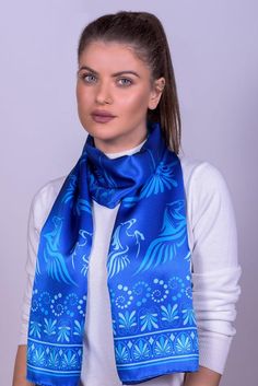 A hand painted silk scarf in blue colors, the colors of Greece, that is made from 100% pure silk in the village of silk in Europe, is named Soufli.  DETAILS Fabric : Crepe Satin 16m/m Dimension : 45cm x170cm Print : Digital Finished : by hand  * Gift box included  ABOUT Pegasus The winged horse of Traditional Blue Scarf As Gift, Blue Satin Silk Scarf As Gift, Blue Satin Silk Scarf For Gift, Traditional Blue Silk Scarf, Traditional Blue Silk Scarves, Artistic Blue Silk Scarf, Blue Satin Scarves, Hand Painted Blue Silk Scarf For Gift, Elegant Hand Painted Blue Silk Scarf