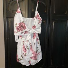 Nwt, Light Weight, Adjustable Straps, Tie Front, Opening At That Peeps Tummy, Elastic Around Waist White With Pinkish Purplish Flowers White Cotton Jumpsuits And Rompers With Floral Print, White Sleeveless Summer Set, White Floral Print Casual Sets, Casual White Floral Print Sets, White Casual Floral Print Sets, White Printed V-neck Jumpsuits And Rompers, White Floral Print Sets For Spring, Spring Season White Floral Print Sets, Spring White Floral Print Sets