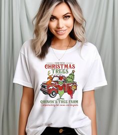 Farm Fresh Christmas Tree Comfort Colors Tshirt , Santa Tree Farm Xmas Tshirt, Red Truck Farming Christmas Holiday Tshirt How can you order? 1- Please review all the information provided before placing an order 2- Select the item type and size using the drop down menu. 3- Select the color of the item using the following drop down menu. 4- Please add the design color (white or black) in the optional message section of the order. 5- Need more Items? Add the current item in the cart. And If you like to add more items to your order please press the back button and repeat steps 1-4 again. 6- Once all your desired items are in your cart you may complete your order by entering your payment method, desired shipping address and click submit. Custom Print, Personalization Print, Personalization requ White Crew Neck T-shirt For Christmas, Custom Print Christmas T-shirt, Christmas Short Sleeve T-shirt With Custom Print, Christmas Graphic Tee With Short Sleeves, Christmas Custom Print Short Sleeve T-shirt, Red Holiday Crew Neck T-shirt, Holiday Red Crew Neck T-shirt, Christmas Graphic Print Short Sleeve T-shirt, Red Crew Neck Holiday T-shirt