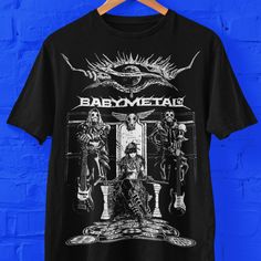 Babymetal graphic t-shirt for fans of J-Pop, K-Pop, heavy metal music. Great gift for J-Pop Metal Fans Bella+Canvas 3001 * 100% Airlume combed and ringspun cotton (fiber content may vary for different colors) * Light fabric (4.2 oz/yd² (142 g/m * Retail fit * Tear away label * Runs true to size With side seams Located along the sides, they help hold the garment's shape longer and give it structural support Shoulder tape Twill tape covers the shoulder seams to stabilize the back of the garment an Rock Style T-shirt With Band Logo For Music Festivals, Halloween Rocker T-shirt For Concerts, Metal Band Merch, Rock Style Band Logo T-shirt For Streetwear, Alternative Style Fan Merchandise T-shirt With Front Print, Alternative Style Graphic T-shirt For Concerts, Alternative Style T-shirt For Music Festival Concerts, Alternative Style T-shirt With Front Print For Concerts, Grunge Band Logo T-shirt For Music Festivals