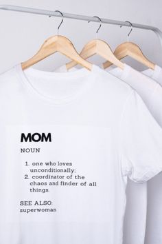 DESCRIPTION: Celebrate the extraordinary bond of motherhood with our heartwarming 'Mom Definition' t-shirt, a perfect ode to the superheroes we call moms. Crafted with love and printed on top-quality fabric, this t-shirt offers both comfort and style, making it an ideal addition to any mom's wardrobe. Our 'Mom Definition' t-shirt features a charming and eye-catching design that beautifully captures the essence of what it means to be a mom. Whether you're a proud mom yourself or looking for a thoughtful gift for the incredible moms in your life, this shirt is a meaningful way to express your love and appreciation. Embrace the joy of motherhood as you wear this t-shirt, flaunting the unique definition artwork that will undoubtedly melt hearts and spark conversations. It's the perfect compani Definition Tshirt, Mom Definition, Mom Wardrobe, Call Mom, Mama Shirts, With Mom, Proud Mom, Family Outing, White Short