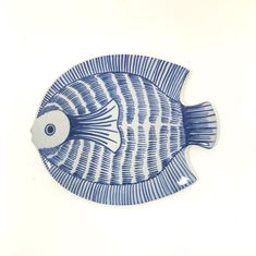 a blue and white fish on a white background with watermarked lines in the bottom