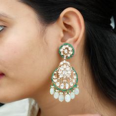 Product Details Gorgeous Heavy Looking Antique Gold Jadau Polki Diamond Earrings, extra large Chandelier Earrings in 14 Karat yellow, rose, and white gold. Jadau Traditional Polki Diamond earrings are amazingly beautiful beyond description. It has a thick post with push-back buttons so the ear gets good support. The modified brilliant-cut of these diamonds reflects the advancement of gem faceting in India. Additionally, the openwork setting is the direct result of Western influence. This is a Ha Large Chandelier, Emerald Bead, Long Dangle Earrings, Yellow Rose, Chandelier Earrings, Pearl Beads, Traditional Outfits, Antique Gold, Diamond Earrings