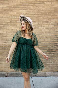 the everly babydoll dress will bring out your inner boho-bougie side. featuring a mini dress style, puffy sleeves, and polka dot pattern in fashionable hunter green, this dress is dreamy, stylish, and just a little bit sassy. transform your wardrobe with one effortless flourish! Plus Size Holiday Dress, Plus Size Babydoll Dress, Baby Doll Dress For Women, Fantasy Sewing, Sabrina Outfits, Dresses For Short Women, Dresses Plus Size Casual, Dress With Combat Boots, Babydoll Dress Outfit