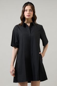 The Danbury Collared Trapeze Mini Dress will have you wanting to spend the day out. It features short sleeves and a button up front leading to a collared neck. The back has an inverted pleat design. It can be easily paired up with sandals or strappy heels. - Pockets- Flutter sleeves- Button up- Boxy fit- Comes in 2 colorsSize + Fit - Model is 5'8" and wearing size XS- Measurements taken from size S - Chest: 19 1/2"- Length: 34 1/2" Fabric Self: 100% Cotton Style Number STD14556 Button Down Shirt Dress, Collared Shirt Dress, 80 Dress, Red Mini Dress, Flutter Sleeves, Babydoll Dress, Strappy Heels, Cotton Style, Mini Black Dress