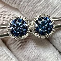 Certified 4TCW Fancy Royal Blue Round Brilliant Cut Moissanite Halo Studs 🎈New for 2024! LOVE these!! 2 x 2CT each ear (10.3mm x 10.3mm) 925 Sterling Silver/White Rhodium - platinum Blue Wedding Earrings, Blue Earrings Wedding, Blue Moissanite, Something Blue Wedding, Something Blue, Blue Wedding, Wedding Earrings, Bride Gifts, Round Brilliant Cut