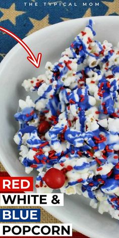 red, white and blue popcorn in a bowl with the words red, white & blue popcorn