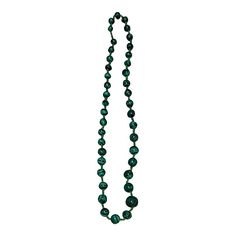 This is part of Chairish’s Costume Jewelry assortment.  Seller delegated shipping, arrives 4-8 days from purchase. Graduated Malachite partially beaded. Purchased in the 70's from the Zaire (now the Congo). It is hand strung uniquely without a clasp. Emerald Beaded Necklace With Round Gemstone Beads, Handmade Emerald Beaded Necklaces With Round Beads, Green Turquoise Necklace With Round Beads In Vintage Style, Green Jewelry With Wooden Beads, Healing Malachite Beaded Necklaces With Round Beads, Artisan Green Single Strand Beaded Necklace, Adjustable Beaded Malachite Necklaces, Green Vintage Jewelry With Wooden Beads, Green Wooden Beads Jewelry