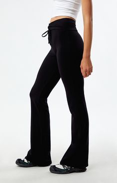 Make a stylish statement with the Low Rise Cinched Flare Pants from PacSun, featuring a unique fold-over waistband with a cinched front detail for added flair. Designed with a flattering low-rise fit and flared leg openings, they offer a trendy twist to elevate your everyday ensemble with effortless sophistication.


	9" rise
	30" inseam
	Low-rise
	Fold-over waistband
	Cinched front detail
	Flared leg openings
	Tight fit
	95% cotton, 5% spandex
	Hand wash
	Model is wearing a size small
	Model measurements: 5’10” height, 31” bust, 23.5” waist, 34.5” hips