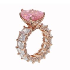 Get the wifey ring, no engagement required! Pear-shaped pink crystal center stone Channel-set emerald cut crystals on shank 18K Rose Gold-plated over sterling silver Pink and clear zircon diamonds Shop our velvet hexagon ring boxes HERE. Sterling silver with clear stones available soon! ℹ Don't see your size? Message us and we will be happy to help Rings For Pinky Finger, Gem Stone Rings, Pink Rings, Emerald Cut Eternity Band, Iced Out Jewelry, Pinky Finger, Womens Rings, Pear Cut Ring, Teardrop Ring