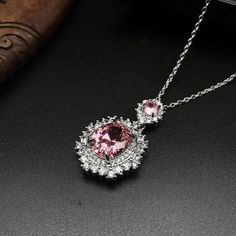 ✰ This delicate lab-created pink gemstone pendant is perfect for people who want to achieve a brilliant and splendid look ✰  Not only for everyday wear, this pink minimalist necklace is also great for weddings and also as a bridesmaid ring ✰ This pink gem necklace with halo is a very special gift for birthday, Mother's Day, bridesmaids, Valentine's Day and more  ✰ Comes with an exquisite gift box We also offer the ring and earring from the same collection:  https://www.etsy.com/listing/1208056812/pink-oval-zircon-ring-with-halo-oval https://www.etsy.com/listing/1222001683/pink-drop-earring-with-halo-oval-zircon Materials: Environmentally-friendly brass Quantity: 1 Pendant with chain Main Gemstone Size: 0.47 x 0.4 in ----♛ PRODUCTION & SHIPPING ♛ --- ✰Multiple items purchased in one payment Pink Gemstone Necklace, Bridesmaid Ring, Pink Drop Earrings, Pink Minimalist, Pink Zircon, Oval Pendant Necklace, Bridesmaid Rings, Zircon Necklace, Princess Necklace