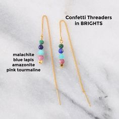 Slim chain threader earrings that pull right through the ear are the perfect touch of edginess in a delicate little package, and now in these beautiful confetti gemstone mixes! choose NEUTRALS — featuring Black Spinel, Pyrite, Tiger Eye and Labradorite — or BRIGHTS — with Malachite, Blue Lapis, Amazonite, and Pink Tourmaline gold-plated threader chain earrings with gemstone beads threaders are lead-free and nickel-free threader earrings are worn by pulling the post through the ear and then slidi Dainty Adjustable Threader Earrings, Adjustable Dangle Threader Earrings, Threader Earrings With Adjustable Chain As A Gift, Delicate Adjustable Threader Earrings As A Gift, Adjustable Chain Threader Earrings As Gift, Gift Threader Earrings With Adjustable Chain, Dainty Linear Earrings With Adjustable Chain For Gift, Dainty Ear Climbers With Ear Wire As Gift, Dainty Ear Climbers As Gift