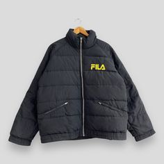 "REMINDER: THIS IS USED CLOTHING PLEASE DO NOT EXPECTED IT LIKE TO BE NEW OR IN PRISTINE CONDITION Feel free to contact me for any question. I'll assist you with my pleasure. Vintage FILA Puffer Goose Down Jacket Xlarge 1990's Fila Italia Sportswear Bomber Jacket Fila Ski Wear Winter Heavy Jacket Black Size XL *All measurements are taken with the garment flat on the ground. SIZE ON TAG :- None but fits like Size XL ACTUAL SIZE MEASUREMENT :- ARM PIT TO ARM PIT :- 26.5\" inches BACK COLLAR TO HEM :- 29\" inches CONDITION :- GREAT USED CONDITION. HAS MINOR STAIN (KINDLY REFER TO THE PICTURES ATTACHED) ** WE ARE USING DHL EXPRESS, IT TAKES 3-5 WORKING DAYS ONLY TO ARRIVE. PLEASE LEAVE YOUR PHONE NUMBER ON THE NOTE WHILE MAKE A PURCHASE** REF : (08-02-2020) 280" Sporty Puffer Outerwear For Streetwear, Sporty Streetwear Puffer Outerwear, Sporty Windbreaker With Padded Collar For Winter, Sporty Winter Windbreaker With Padded Collar, Sporty Puffer Windbreaker For Cold Weather, Sportswear Puffer Jacket For Streetwear, Sporty Streetwear Track Jacket With Padded Collar, Sporty Track Jacket With Padded Collar For Streetwear, Sporty Puffer Jacket With Pockets For Sports