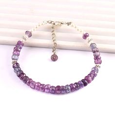 "Extremely Alexandirite Beads Rare Alexandirite Faceted Rondelle Beads Sparkling Color Change Stone Beads Bracelet Product -; Rare Alexandrite Grade-: AAA High Quality Stone shape-: Faceted Beads Shape Color= PINK Green Purple Length-: 7\"Inch Quantity -: 1 Strand Size-: 4 to 5 MM Genuine Measurements and weight are close to approximations We accept bulk or wholesale orders for any gemstone which you'll get best wholesale prices! Hence you can contact me with your requirement of bulk or wholesal Alexandrite Gemstone, Beads Bracelet, Faceted Bead, Green And Purple, Stone Beads, Gemstone Beads, Color Change, Pink And Green, Violet