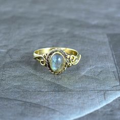 Labradorite Ring/Handmade Ring/Dainty Ring/Unique Ring/Statement Ring/Women Ring/Vintage Ring/Boho Ring/Promise Ring/Anniversary gift/Gifts For Her METAL :- Brass FINISH :- gold STONE :- Labradorite Ring can be customized on request and gemstone can be made to any gemstone you want. Same Design Ring Are Upload With Any Gemstone. Please Visit Our Shop to View Complete Collection. If You Need Faster Shipping, Please Contact us Please Make Sure to Include The Correct Address During Before Order. Yo Vintage Open Moonstone Gemstone Ring, Handmade Spiritual Open Opal Ring, Bohemian Rings For Jewelry Making With Stone Setting, Spiritual Gold Labradorite Rings, Antique Handmade Toe Ring, Handmade Bohemian Oval Crystal Ring, Bohemian Handmade Oval Crystal Ring, Handmade Moonstone Toe Ring As A Gift, Vintage Oval Labradorite Jewelry