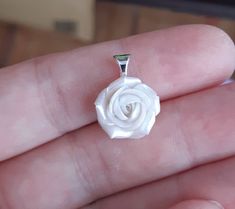 "This delicate pendant with handmade rose made of polymer clay. Metal bail in silver color (Bails hole 5*4 mm/ 0,2*0,16 inch). EACH PETAL MADE BY HAND Polymer clay isn't afraid of water, strong, but you must take care as any jewelry piece, it can be cleaned with water and a soft cloth. Gorgeous gift for women and girls as handmade item. Rose about 15 mm/ 0,6\" across. Thickness of rose about 1 cm/ 0,39\" SET WITH PEARL ROSES (choker, stud earrings, ring): https://www.etsy.com/listing/701447438/w Fimo Ring, White Pearl Ring, Clay Ring, Polymer Clay Ring, Floral Pendant Necklace, Flower Statement Necklace, Delicate Pendant, Unique Pendant Necklace, Malachite Pendant