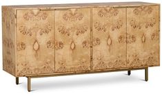 an art deco sideboard with carved wood panels