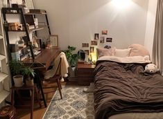 a bed sitting in a bedroom next to a desk