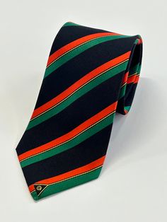 "Each tie is 100% woven silk and measures 61\" long. Regular-width ties are 3.25\" wide and Skinny ties are 2.5\" wide. While serving as a Bishop, I would gift my outgoing missionaries a tie that I wore during my mission to Tennessee, and I sent them off with a charge to \"Return with Honor.\" Once I ran out of my own ties, I was on the hunt to find meaningful replacement ties to give to my missionaries. That's why we found and expanded StatesmanTies.com. A Statesman Tie is \"A Tie That Means So Classic Multicolor Neckwear For Black Tie, Striped Standard Tie For Formal Occasions, Classic Formal Multicolor Ties, Multicolor Standard Tie For Semi-formal Occasions, Classic Multicolor Formal Ties, Multicolor Office Ties, Classic Multicolor Ties For Semi-formal Occasions, Classic Multicolor Office Ties, Vanuatu Flag