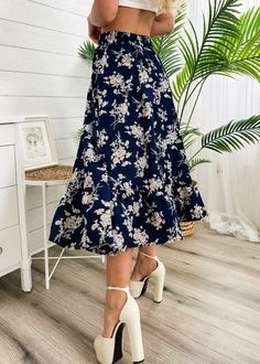 The Emes Shop skirt is detailed with vintage floral prints. Features a high waist. gartered waist. A-line silhouette. and below knee length. Pair it with a puff sleeve blouse and sandals for a classy look.MATERIAL:100% Soft Poly MEASUREMENTS:Dress Length is 31"-33"in Small | Waist: 26"-28"in Medium | Waist: 28"-30"in Large | Waist: 30"-32"in X Large | Waist: 32"-34"in MEASUREMENTS:Dress Length is 78"-83"in Small | Waist: 66"-71"cm Medium | Waist: 71"-76"cm Large | Waist: 76"-81"cm X Large | Waist: 81"-86"cm Flowy Midi Skirt For Garden Party, Vacation Midi Length Gathered Skirt, Spring Knee-length Ruffled Skirt, Midi Length Ruffled Skirt For Day Out, Midi-length Ruffled Skirt For Day Out, Summer Floral Print Tiered Skirt, High Waist Floral Print Skirt For Summer, Floral Print Flowy Skirt For Day Out, Long Floral Print Skirt For Brunch