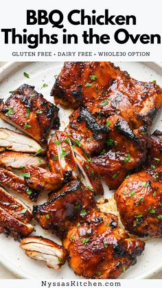 bbq chicken thighs in the oven on a white plate