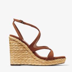 An update to a wardrobe classic, the Ayla sandal is crafted from suede with a raffia wedge heel. Elegant curved straps make this a flattering silhouette that is complemented by a modern square toe. Wedding Guest Bags, Sneaker Dress Shoes, Wardrobe Classic, Wardrobe Edit, Back Bag, Fragrance Gift, Modern Square, Suede Wedges, Boot Bag