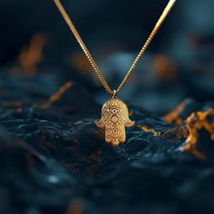 Elevate your style with our 14k Gold Hamsa Hand Pendant. This solid gold necklace showcases exquisite craftsmanship, symbolizing protection and blessings. The 14 karat gold Hamsa Hand pendant is more than just jewelry; it's a fine representation of symbolism and cultural significance, also available in 18k yellow gold. PENDANT INFORMATIONThis pendant is made of real, solid gold.• Made in USA• Material: 14k or 18k solid gold• Finish: polished• Height: 1.25" (31,5 mm) x Width: 0.95" (24 mm)• Penda Engraved Amulet Jewelry For Good Luck, Amulet Style Pendant Necklace With Charms, Amulet Style Jewelry With Large Pendant For Blessing, Spiritual 14k Gold Locket Necklace, Yellow Gold Jewelry With Intricate Design For Rituals, Rituals Intricate Design Yellow Gold Jewelry, Handmade Yellow Gold Necklaces For Blessing, Handmade Yellow Gold Necklace For Blessing, Spiritual 14k Gold Locket Jewelry